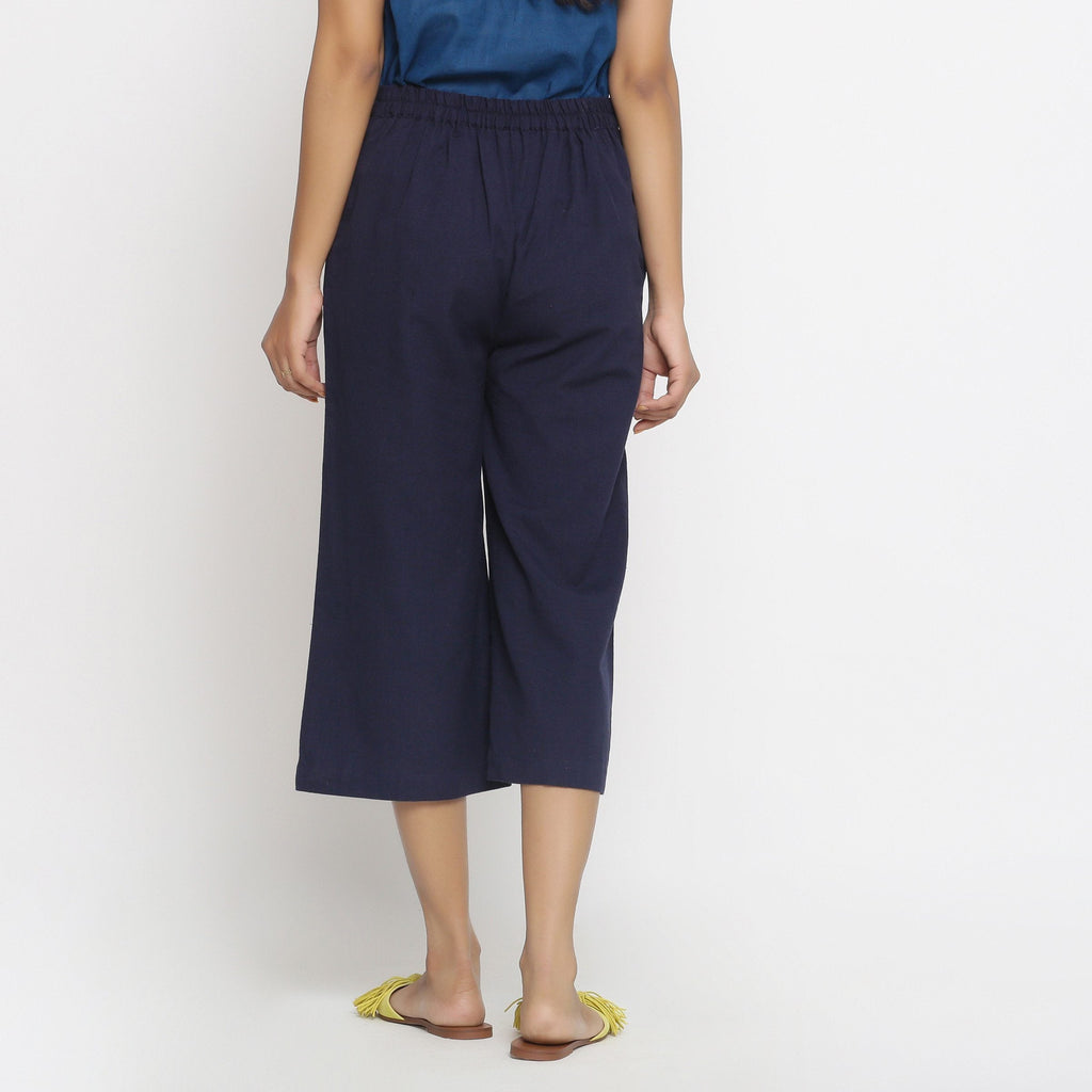 Back View of a Model wearing Solid Navy Blue Cotton Flax Culottes
