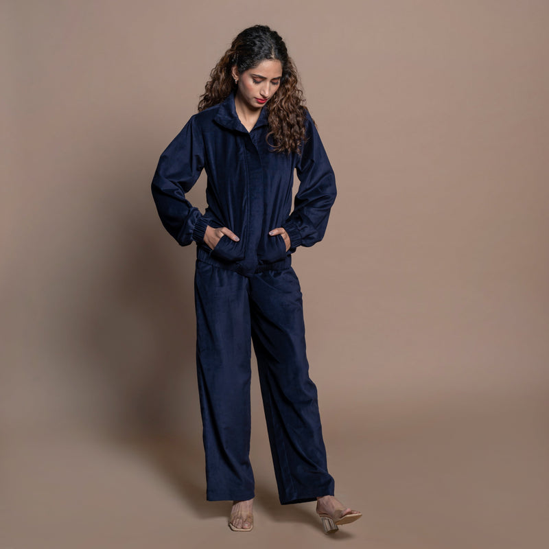 Front View of a Model wearing Navy Blue Cotton Velvet Bomber Jacket