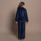 Back View of a Model wearing Navy Blue Cotton Velvet Bomber Jacket