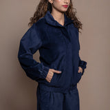 Front Detail of a Model wearing Navy Blue Cotton Velvet Bomber Jacket