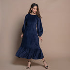 Front View of a Model wearing Navy Blue Cotton Velvet Tier Maxi Dress