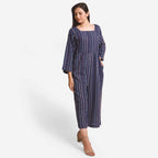 Front View of a Model wearing Navy Blue Crinkled Cotton Flared Jumpsuit