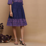 Right View of a Model wearing Navy Blue Ikat Handspun Tier Skirt