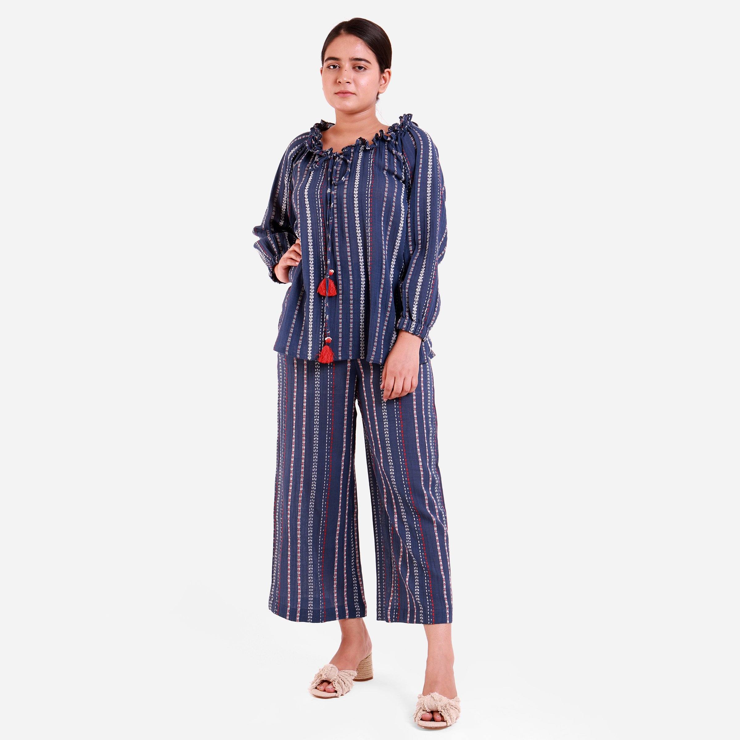 Front View of a Model wearing Navy Blue Off-Shoulder Top and Striped Culottes