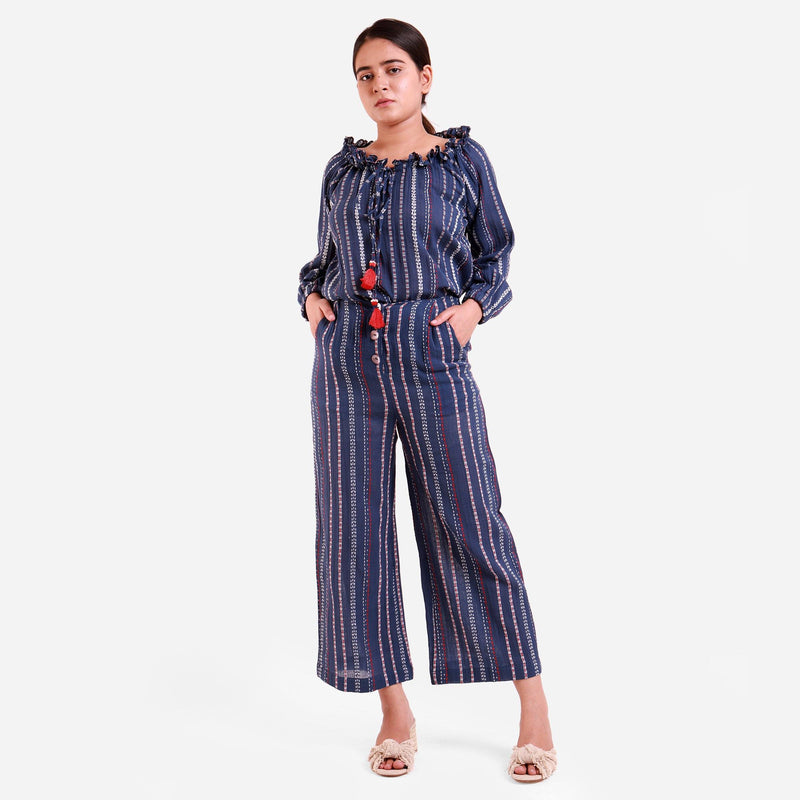 Front View of a Model wearing Navy Blue Off-Shoulder Top and Striped Culottes