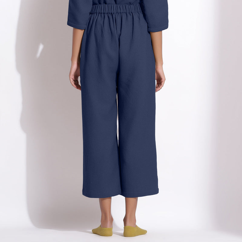 Back View of a Model wearing Navy Blue Cotton Waffle Relaxed Culottes