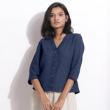 Front View of a Model wearing Navy Blue Cotton Waffle Button-Down Top