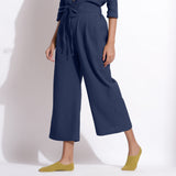 Left View of a Model wearing Navy Blue Cotton Waffle Relaxed Culottes