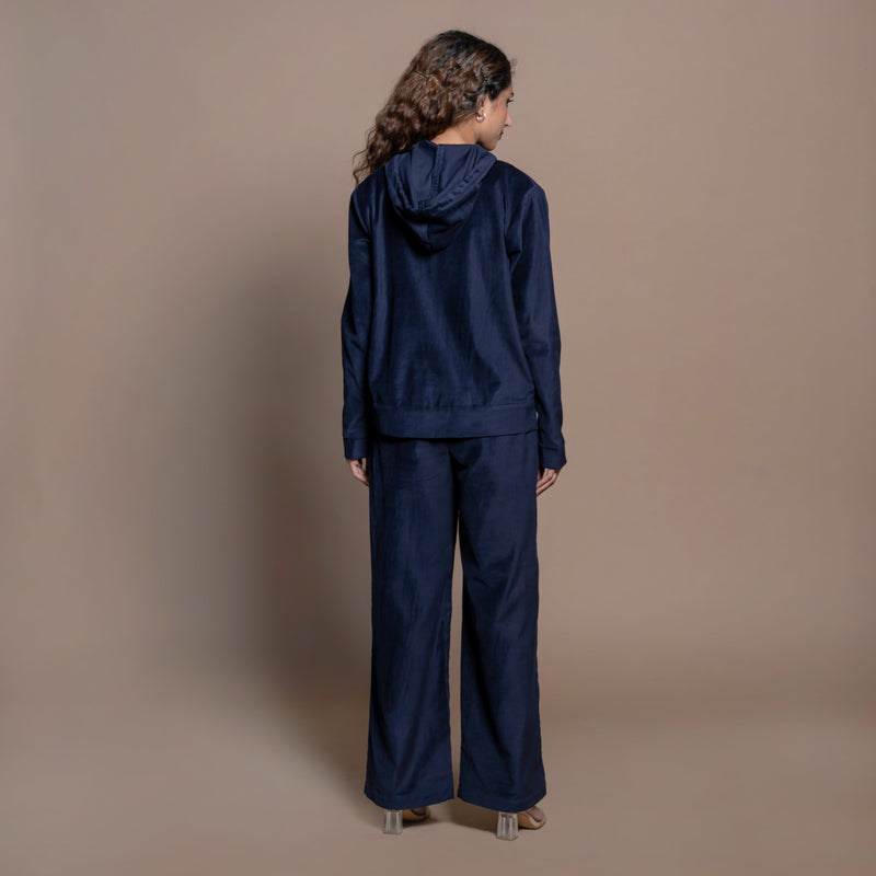 Back View of a Model wearing Navy Blue Velvet Hoodie and Track Pant Set