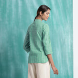 Back View of a Model wearing Ocean Green Handspun 100% Cotton Button-Down Top