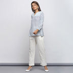 Left View of a Model wearing Off-White And Sky Blue A-Line Yoked Top
