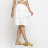 Right View of a Model wearing Off-White Cotton Dobby Ruffled Skirt