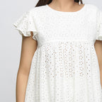 Front Detail of a Model wearing Off-White Cotton Schiffli Yoked Top