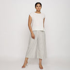 Front View of a Model wearing Off-White Cotton Slub Straight Top