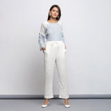 Front View of a Model wearing Off-White Crinkled Cotton Tapered Pant