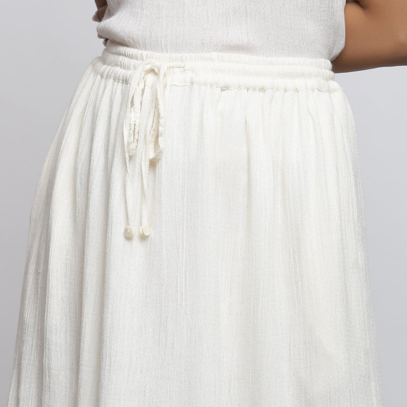 Front Detail of a Model wearing Off-White Crinkled Cotton Flared Skirt