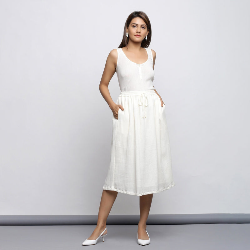 Front View of a Model wearing Off-White Crinkled Cotton Top and Skirt Set