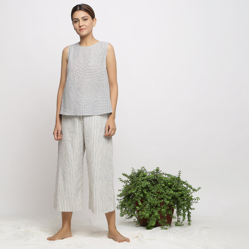 Front View of a Model wearing Off-White Flared Top and Handspun Culottes Set