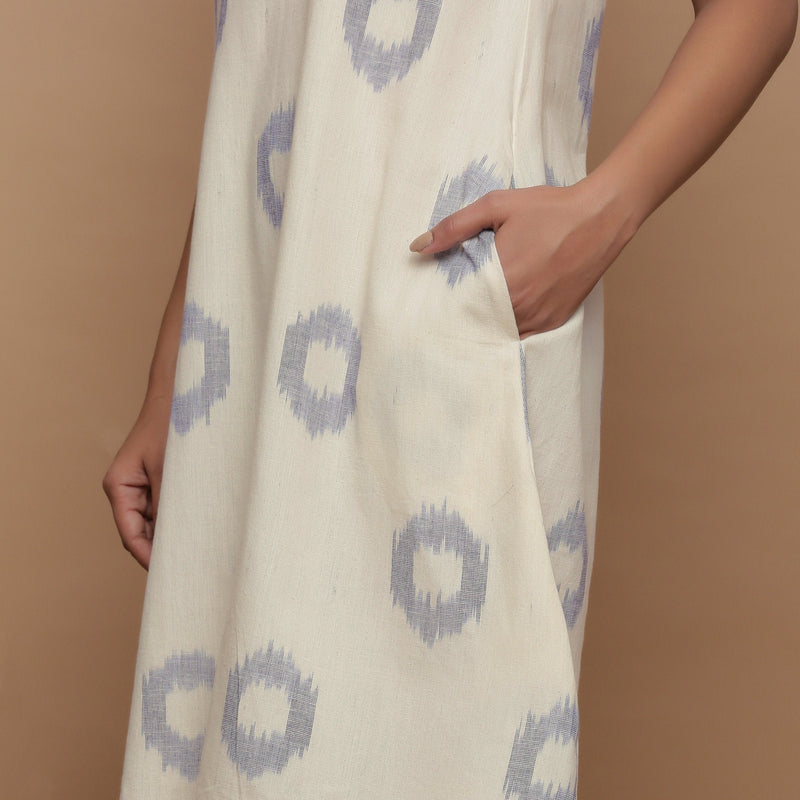 Left Detail of a Model wearing Off-White Paneled Sleeveless Cotton Dress