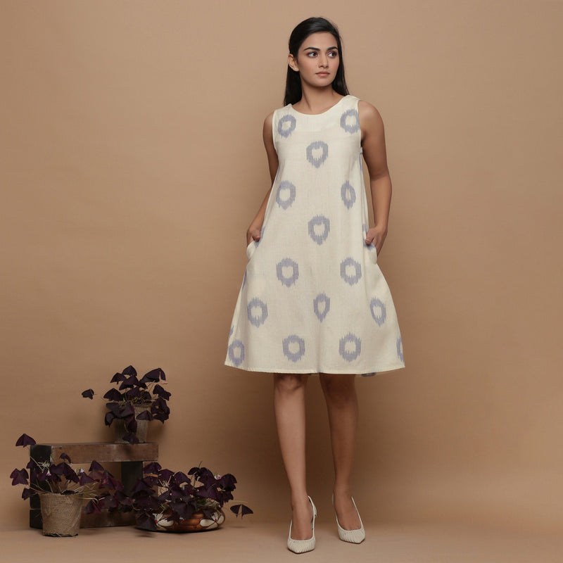 Front View of a Model wearing Off-White Paneled Sleeveless Cotton Dress