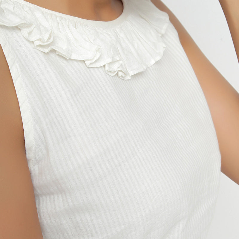 Front Detail of a Model wearing Ruffled Off-White Cotton Peplum Top