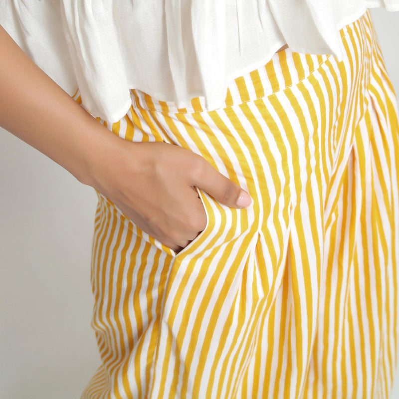Front Detail of a Model wearing Yellow Striped Wide Legged Cotton Pant