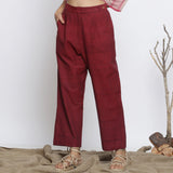 Front View of a Model Wearing Maroon Handspun Straight Fit Pant