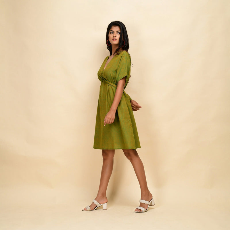 Left View of a Model wearing Olive Gold 100% Cotton Khadi Blouson Dress