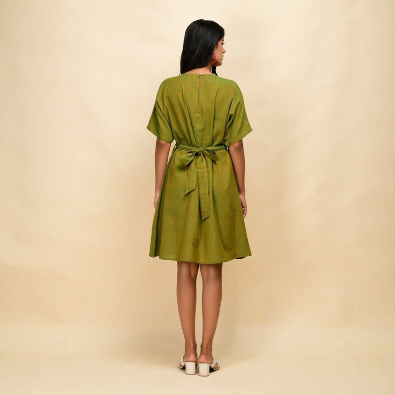 Back View of a Model wearing Olive Gold 100% Cotton Khadi Blouson Dress
