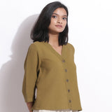Right View of a Model wearing Olive Green Cotton Waffle Button-Down Top