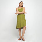 Front View of a Model wearing Olive Green Criss-Cross Cotton A-Line Dress
