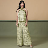 Front View of a Model wearing Olive Green Flared Top and Shibori Pant Set