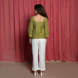 Back View of a Model wearing Olive Green Handspun Cotton Beaded Top