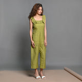 Front View of a Model wearing Olive Green Handspun Cotton Frilled Jumpsuit