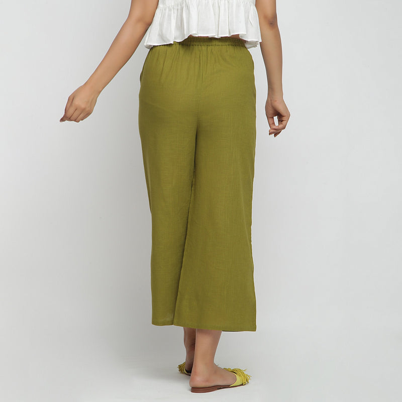 Back View of a Model wearing Olive Green Wide Legged Straight Pant