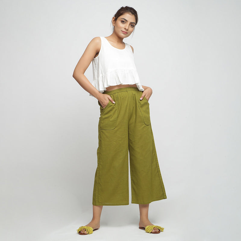 Front View of a Model wearing Olive Green Wide Legged Straight Pant