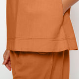 Close View of a Model wearing Vegetable-Dyed Orange 100% Cotton A-Line Top