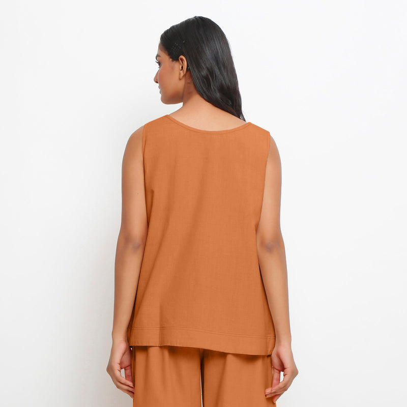 Back View of a Model wearing Vegetable-Dyed Orange 100% Cotton A-Line Top