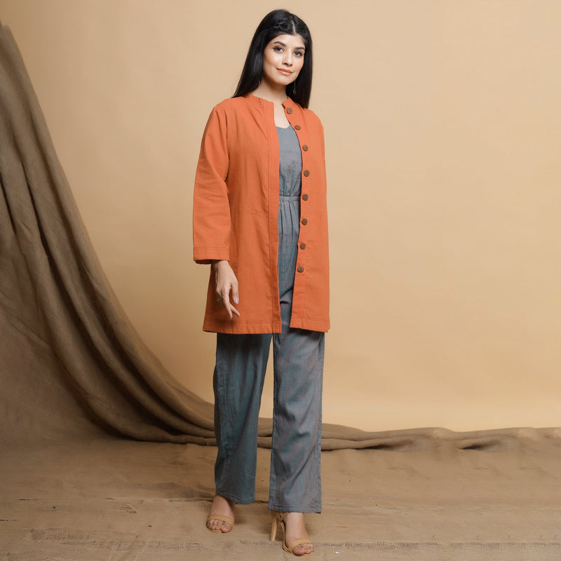 Front View of a Model wearing Orange Button Down High Neck Outerwear