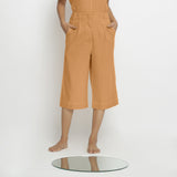 Front View of a Model wearing Vegetable Dyed Orange 100% Cotton Mid-Rise Culottes