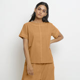 Front View of a Model wearing Vegetable-Dyed Orange 100% Cotton Paneled Top