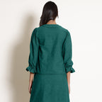 Back View of a Model wearing Pine Green Frilled Sleeve Button Down Top