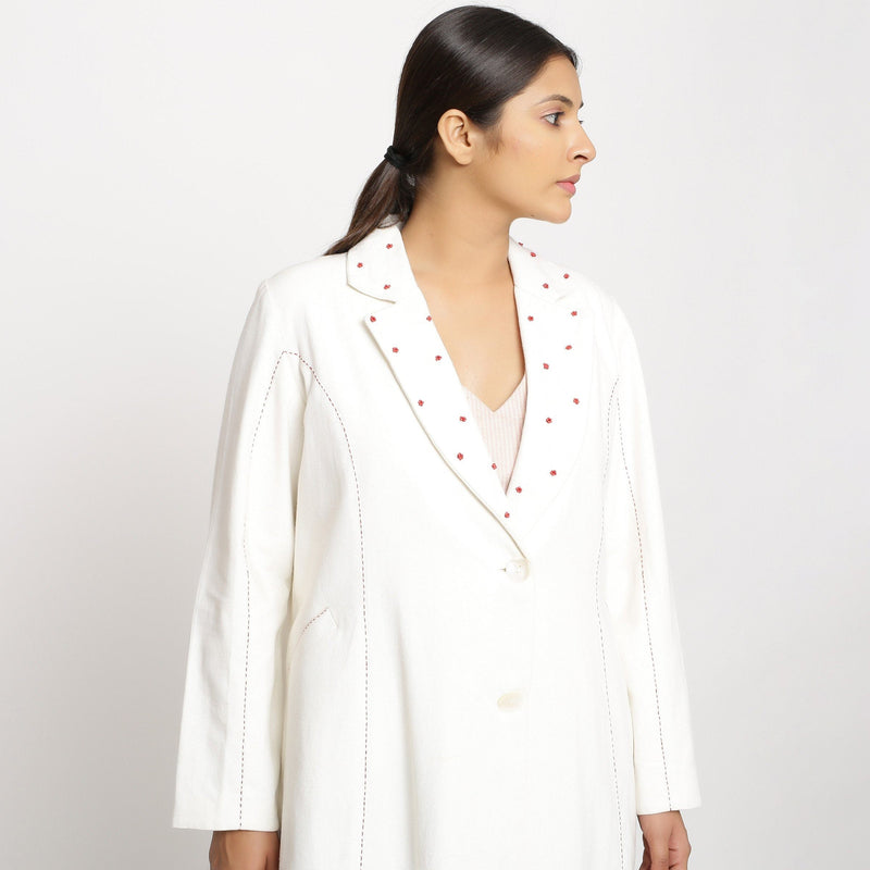 Front Detail of a Model wearing Off-White Hand Beaded Princess Line Overcoat