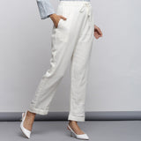 Right View of a Model Wearing Off-White Crinkled Cotton Tapered Pant
