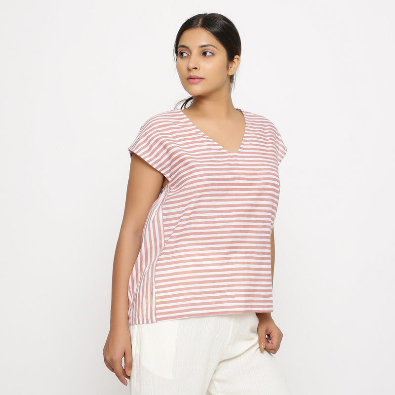 Right View of a Model Wearing Pink and White Hand Screen Print Gathered Top