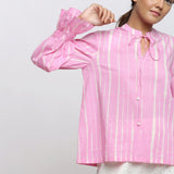 Front Detail of a Model wearing Pink Hand Tie Dyed Shirred Blouson Top