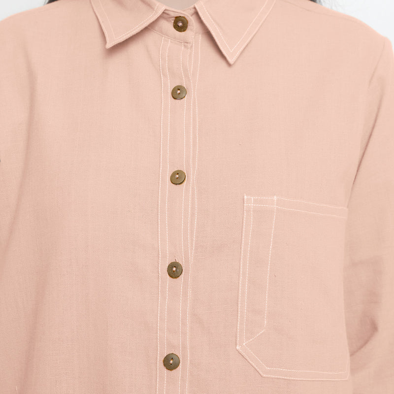 Front Detail of a Model wearing Vegetable Dyed Button-Down Pink Top