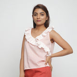 Front View of a Model wearing Pink Frilled Cotton Chambray Straight Top