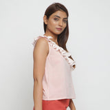 Right View of a Model wearing Pink Frilled Cotton Chambray Straight Top