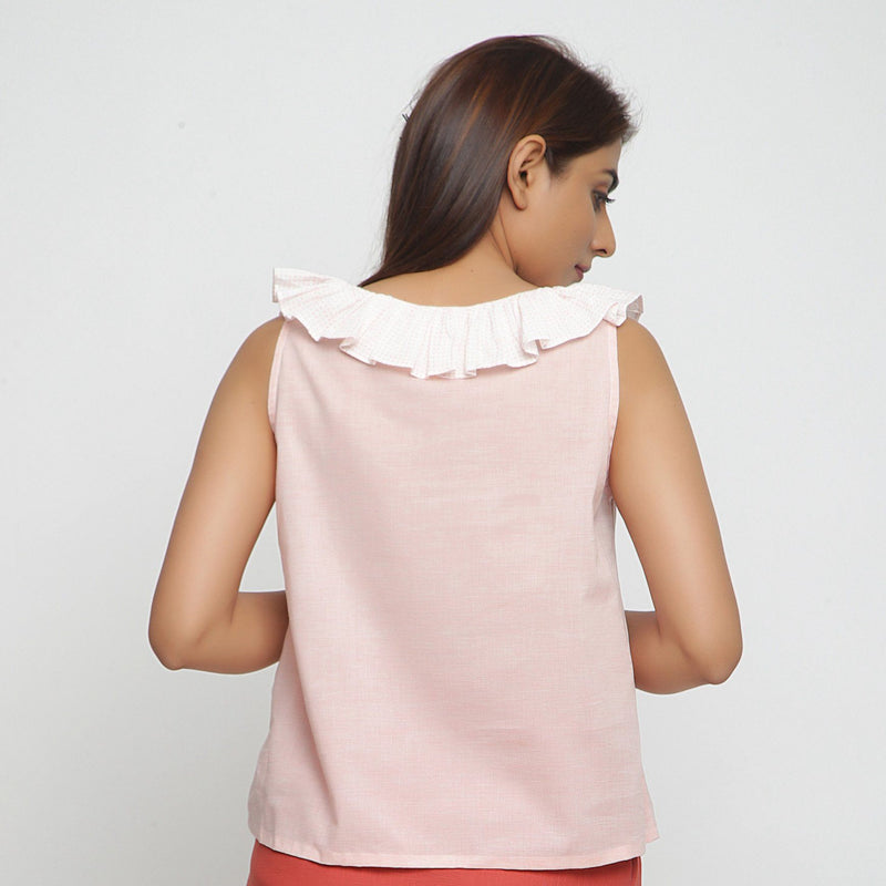 Back View of a Model wearing Pink Frilled Cotton Chambray Straight Top
